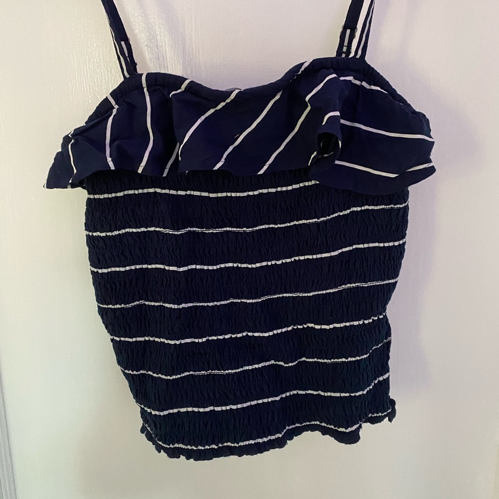 Navy and white girls tank top with ruffle.